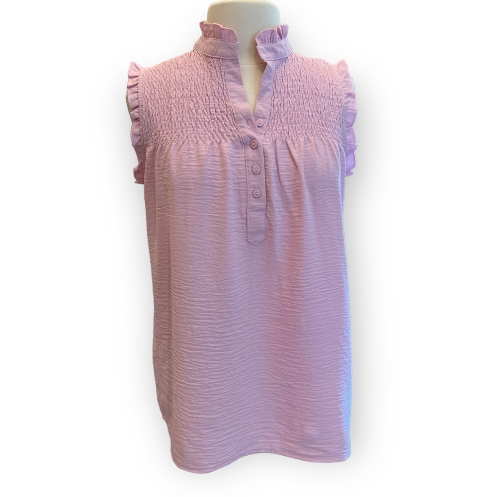 Smocked blouse with ruffle neckline, and relaxed fit bodice Medium​​​​​​​